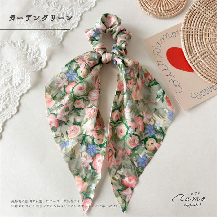 シュシュ リボン 花のある庭