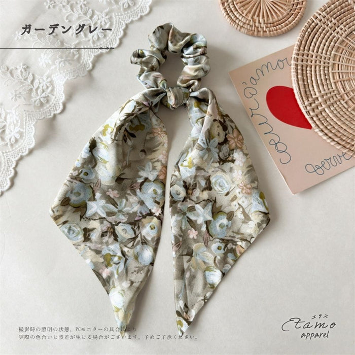 シュシュ リボン 花のある庭